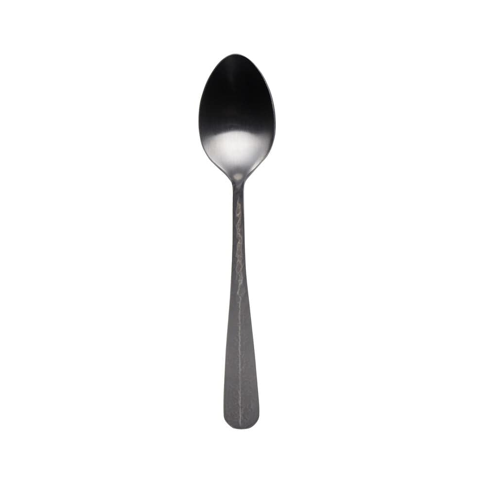 Flat-lay of four black mini coffee spoons with hammered handles on marble backdrop