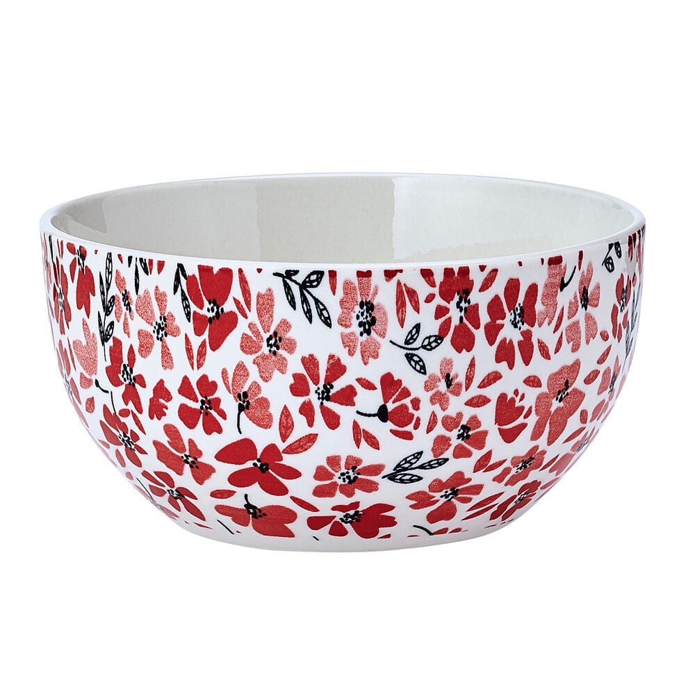Stacked set of bright, colorful dinnerware with floral design, ideal for entertaining