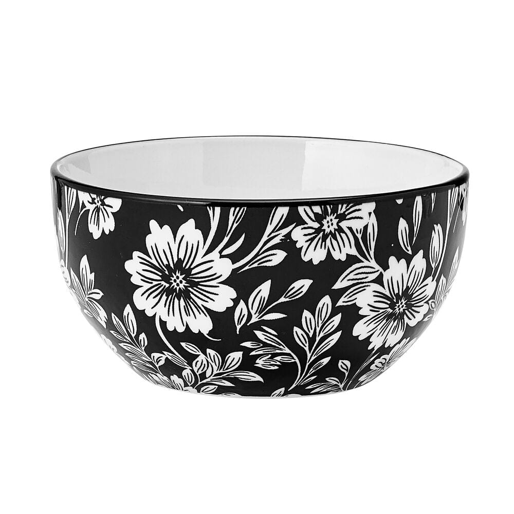 Elegant table setting with Midnight Blooms dinnerware set for four, ideal for entertaining guests