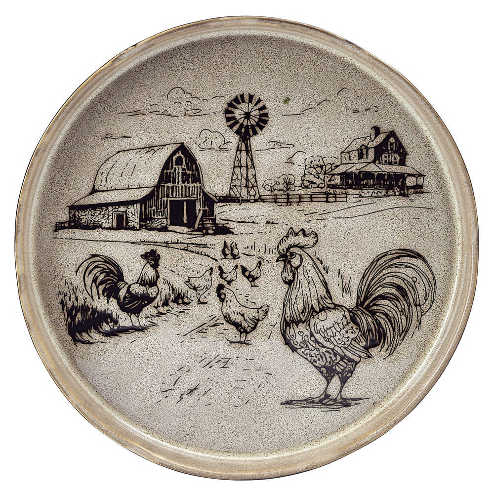 Rustic Rooster dinnerware pieces arranged on a wooden table, highlighting their earthy tones.