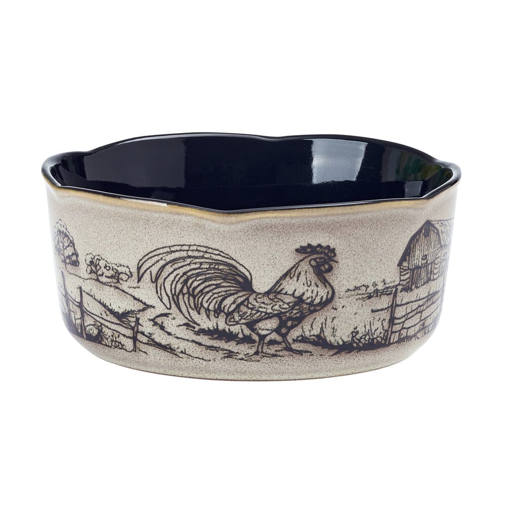 Close-up of the Rustic Rooster dinnerware set displaying intricate barn and rooster designs.