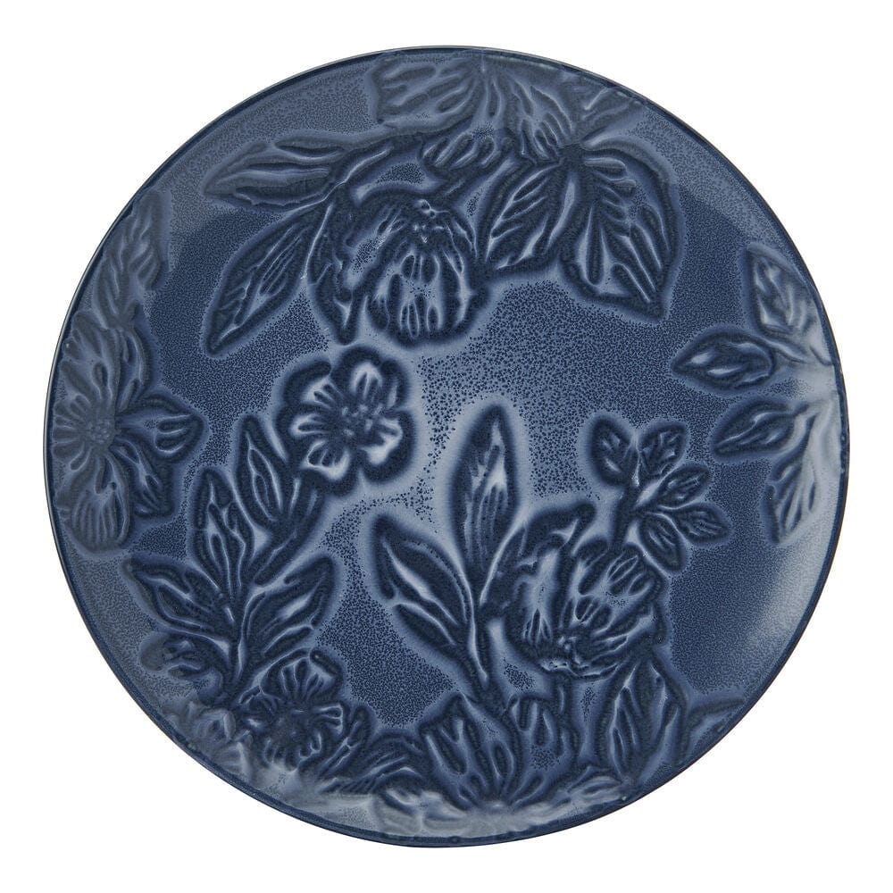 Stacked floral dinnerware for display, showcasing durability and design