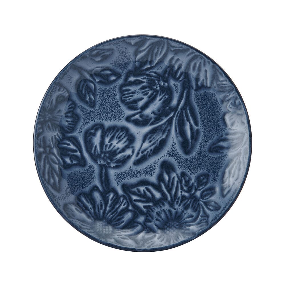 Close-up of blue floral dinnerware set for 4 on a dining table