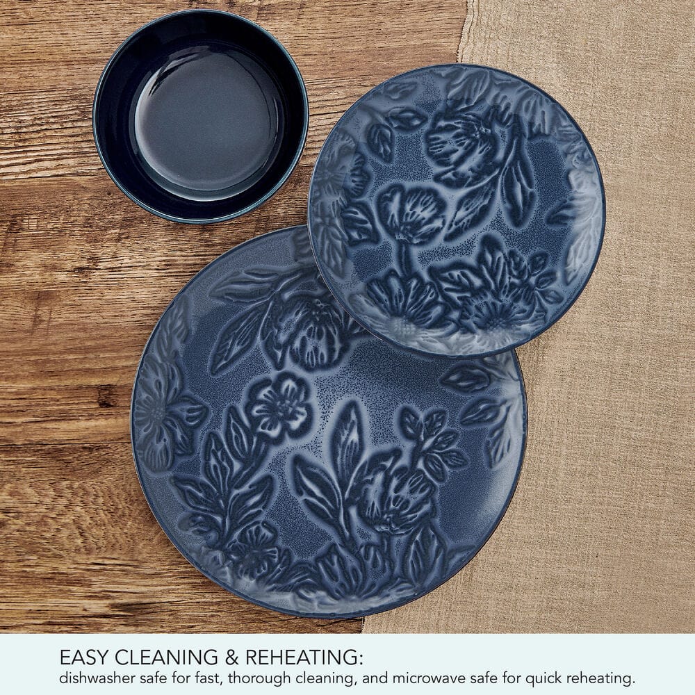 Close-up of blue floral dinnerware set for 4 on a dining table