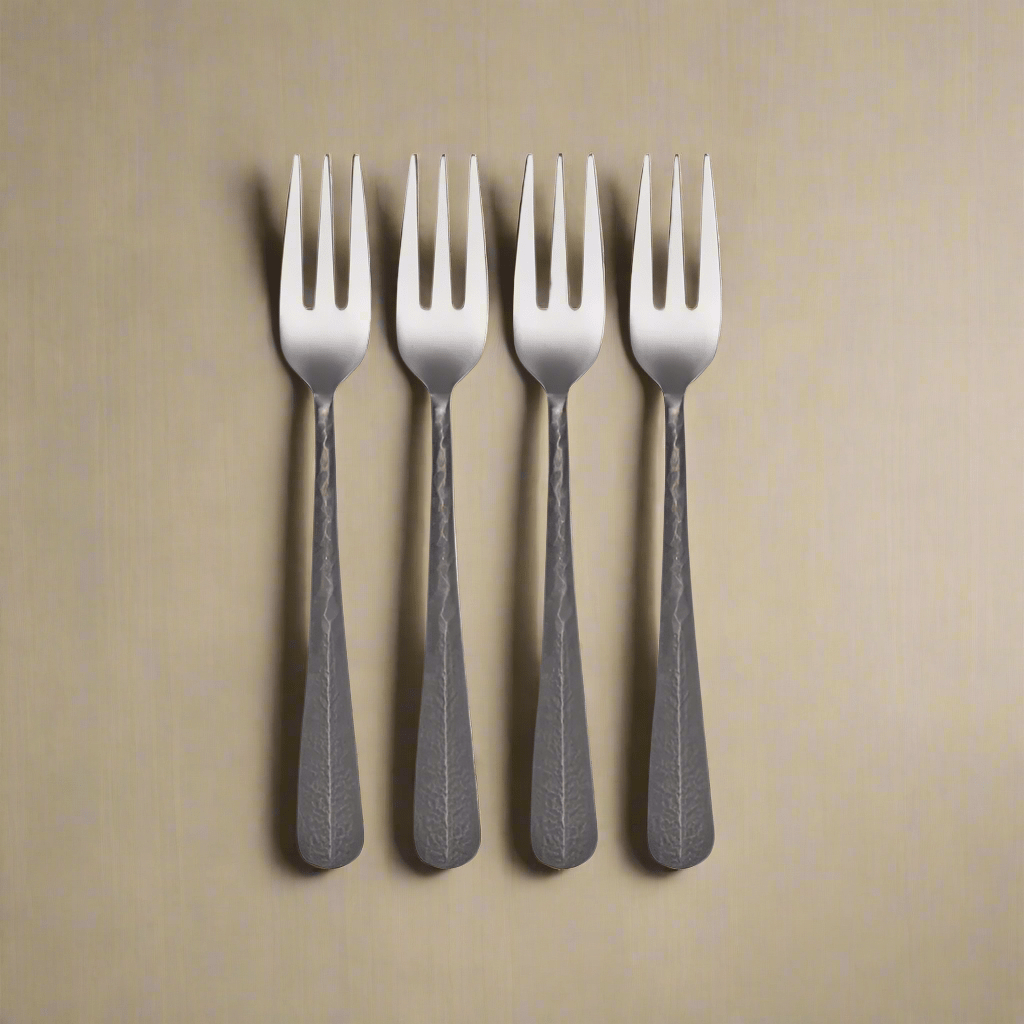Set of four black appetizer forks with hammered texture, ideal for catering and parties