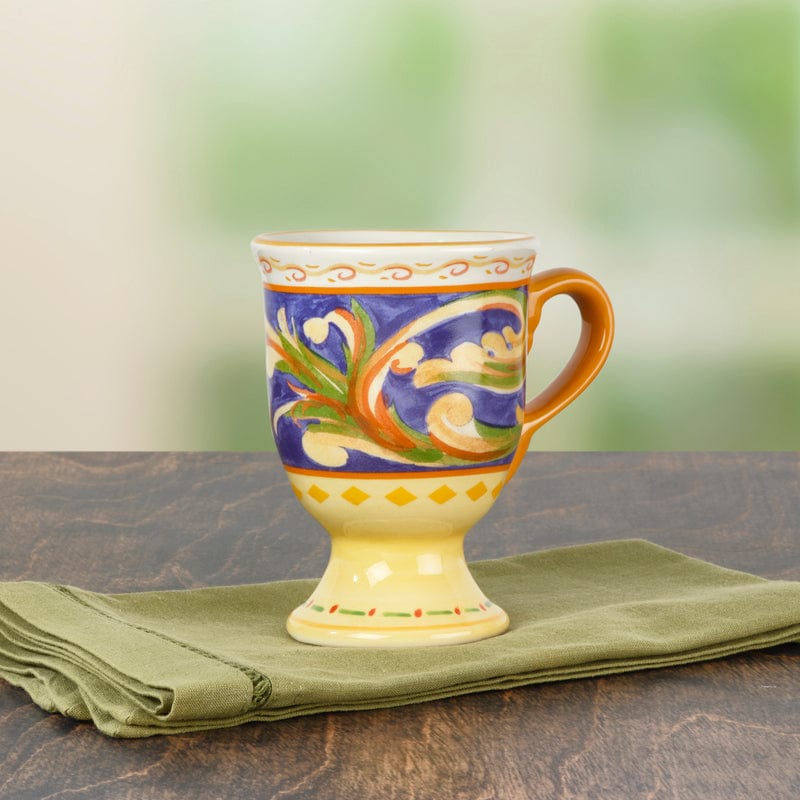 Elegant stoneware pedestal mug with a sturdy base, perfect for coffee and tea.