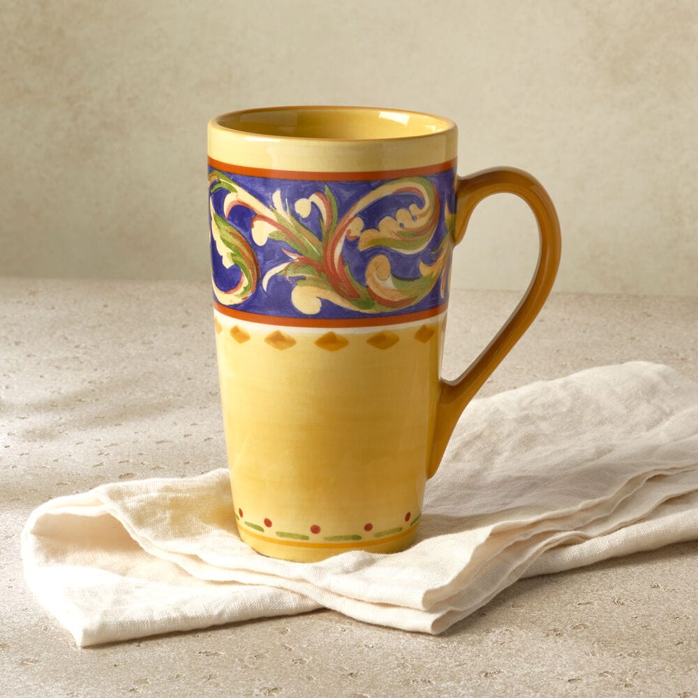Large stoneware latte mug with froth on coffee