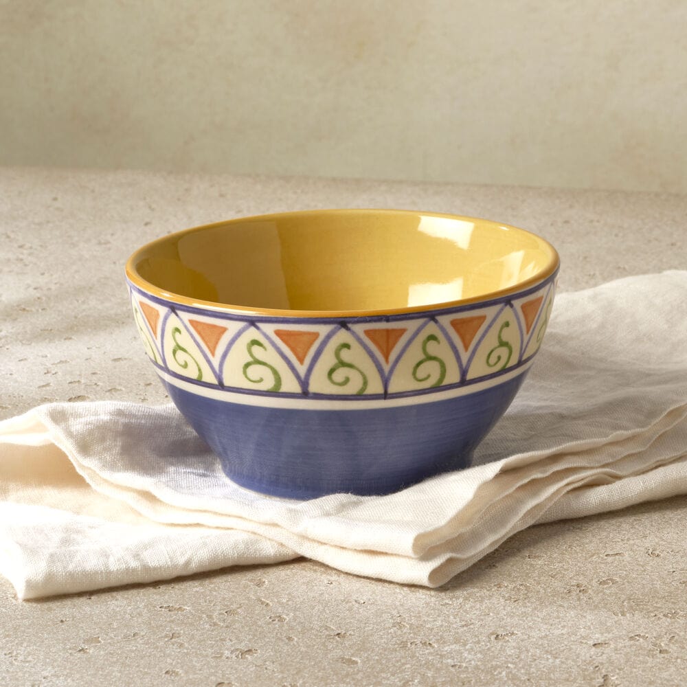 Top-down view of the stoneware everything bowl filled with hearty soup, showing microwave safe use