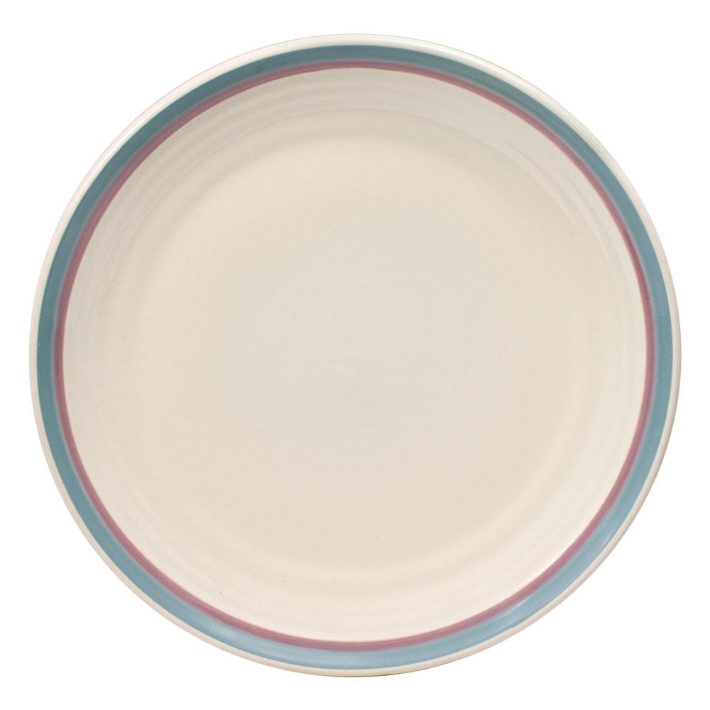 Stacked stoneware plates ready for a meal, showcasing their durable design.