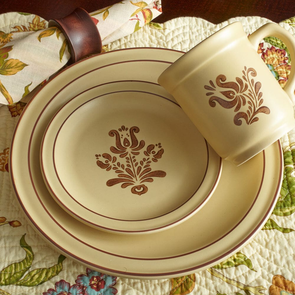 Stylish stoneware mugs on a table, perfect for enjoying hot beverages during a cozy evening.