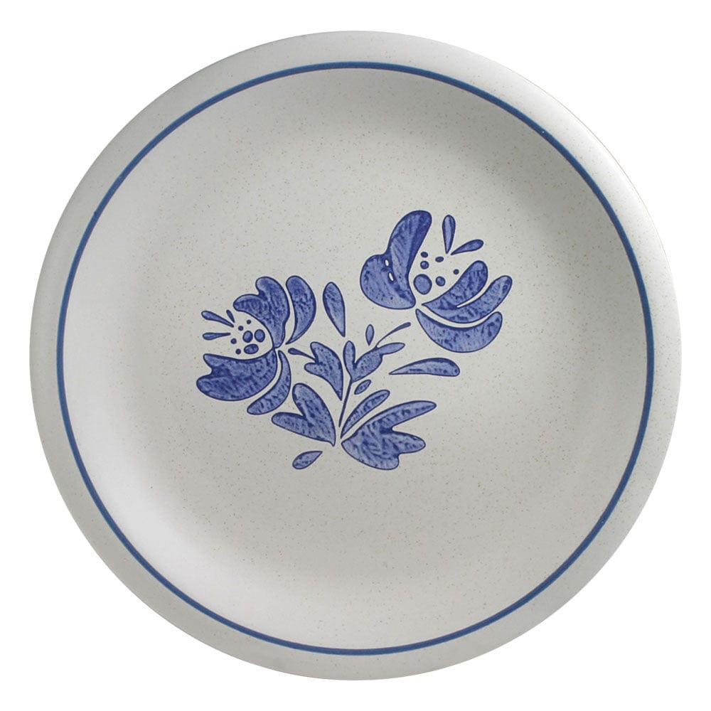 Close-up of 10-inch stoneware dinner plates stacked neatly