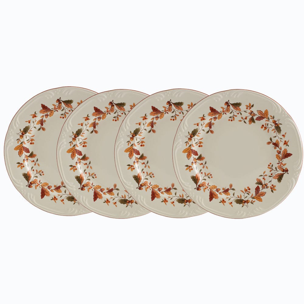 Stacked stoneware salad plates in a modern dining setup