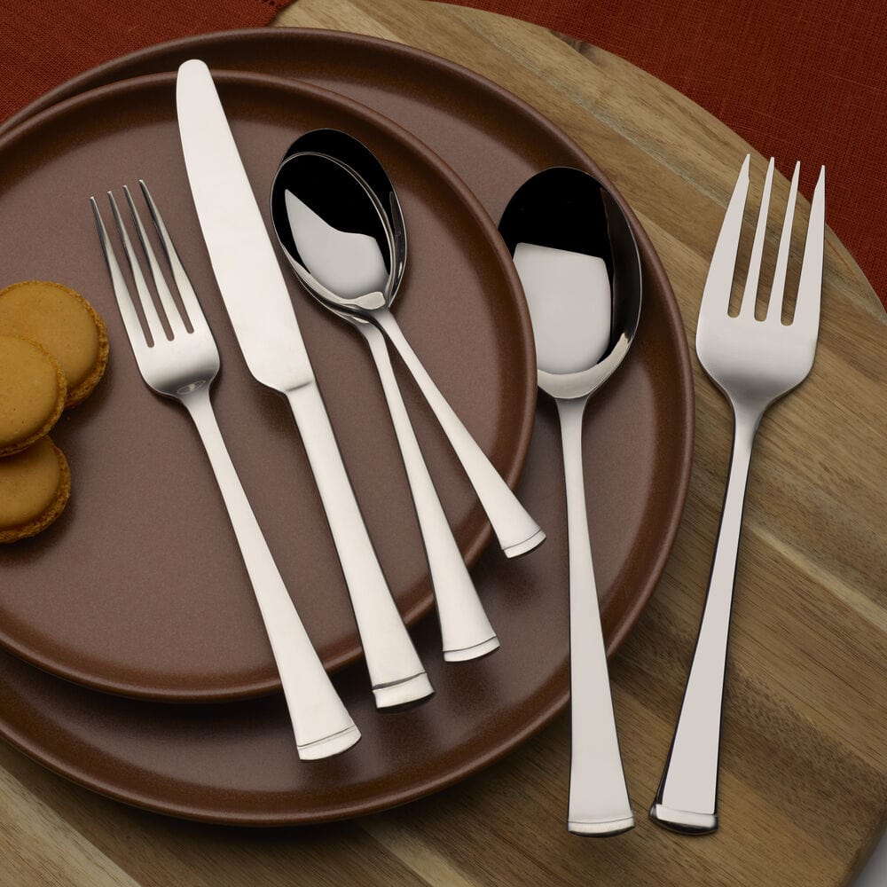 Serving utensils from the Conley flatware set, perfect for family meals.
