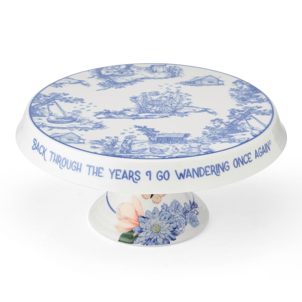 Close-up of the decorative cake plate featuring Dolly Partons lyrics, perfect for showcasing desserts.