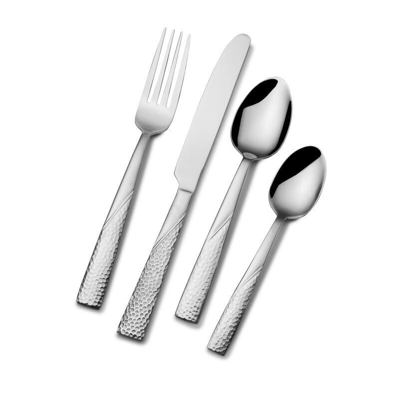 Close-up of the hammered texture on the Loring flatware set, highlighting the superior quality of the stainless steel.