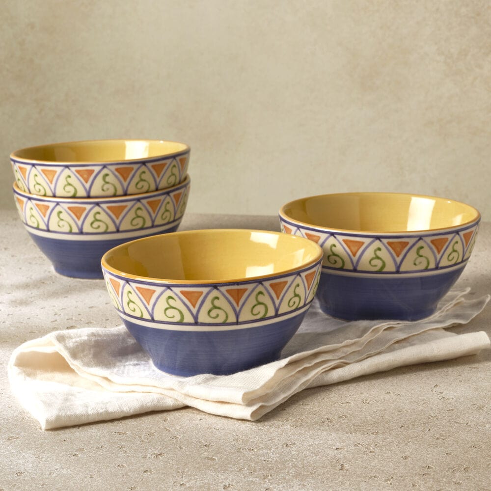 Close-up of stoneware bowls with soup, showing durability and style
