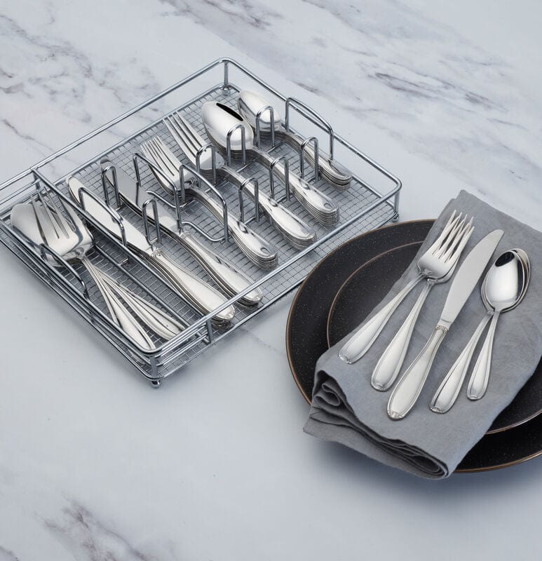 Linden stainless steel flatware set with dinner forks, knives, and spoons on a modern table