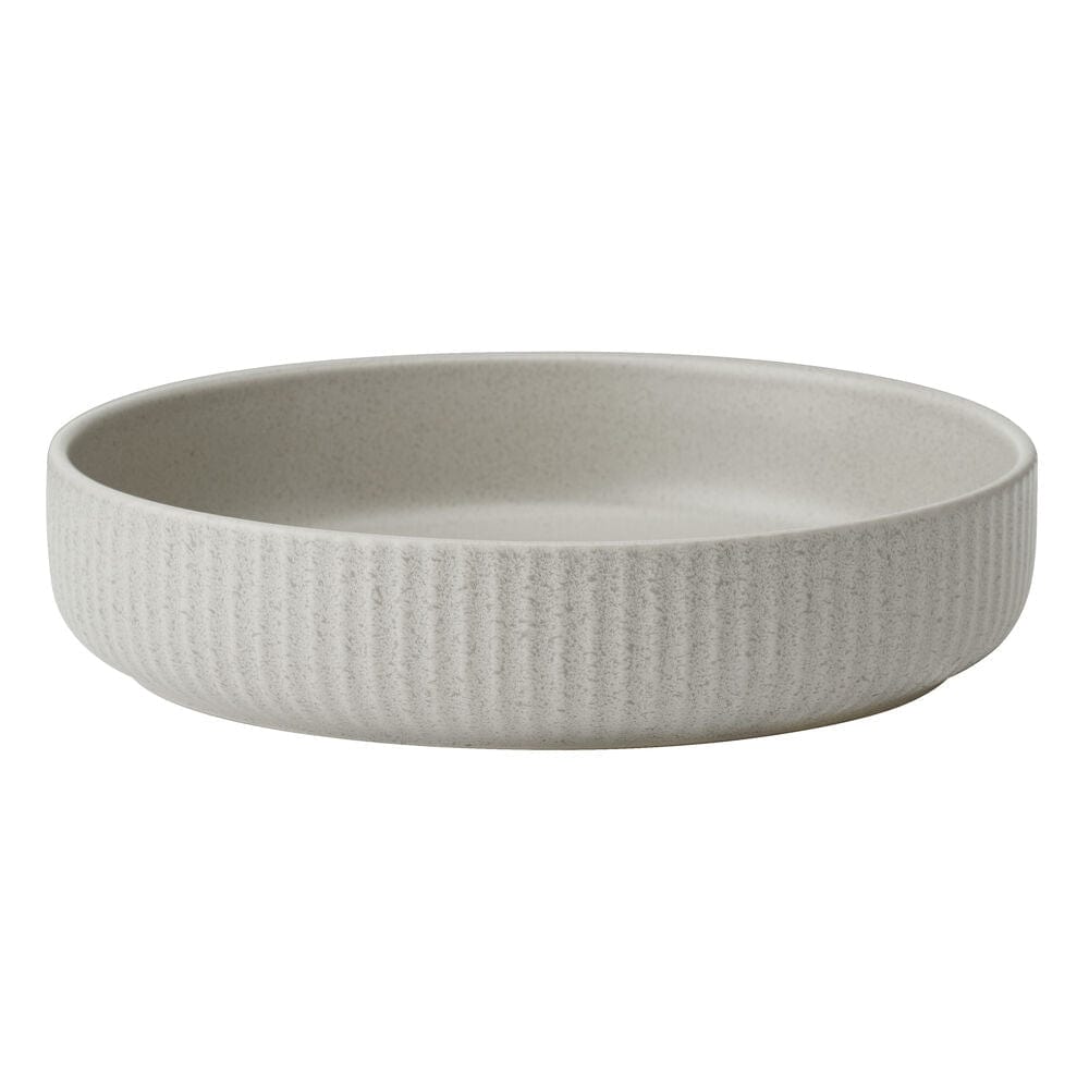 Four bowls from the Serenity 12-Piece Dinnerware Set displayed in a warm cream shade.