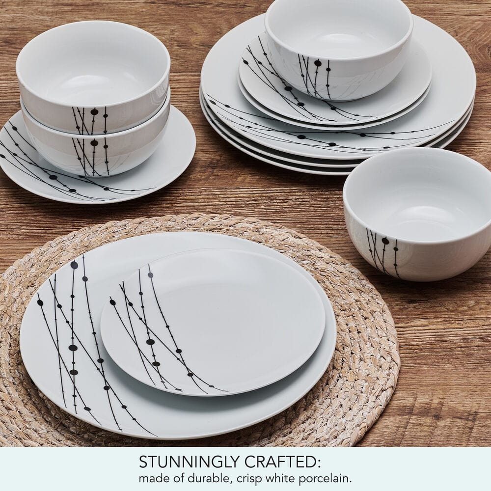 Stacked ceramic dinnerware with unique design on a dining table