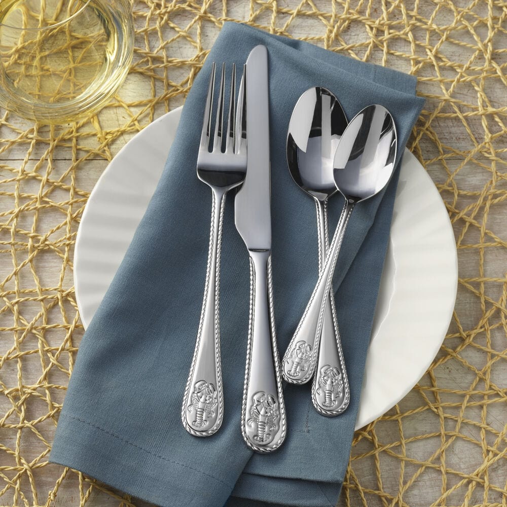Close-up of the Lobster Flatware Set showcasing the embossed design on the handles.