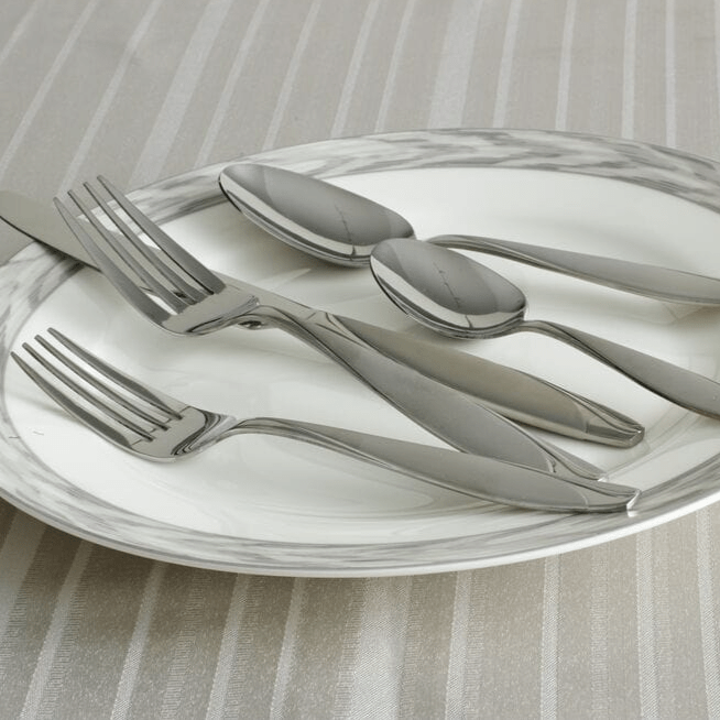 Close-up of Lunea Frost stainless steel flatware with frosted teardrop handle design