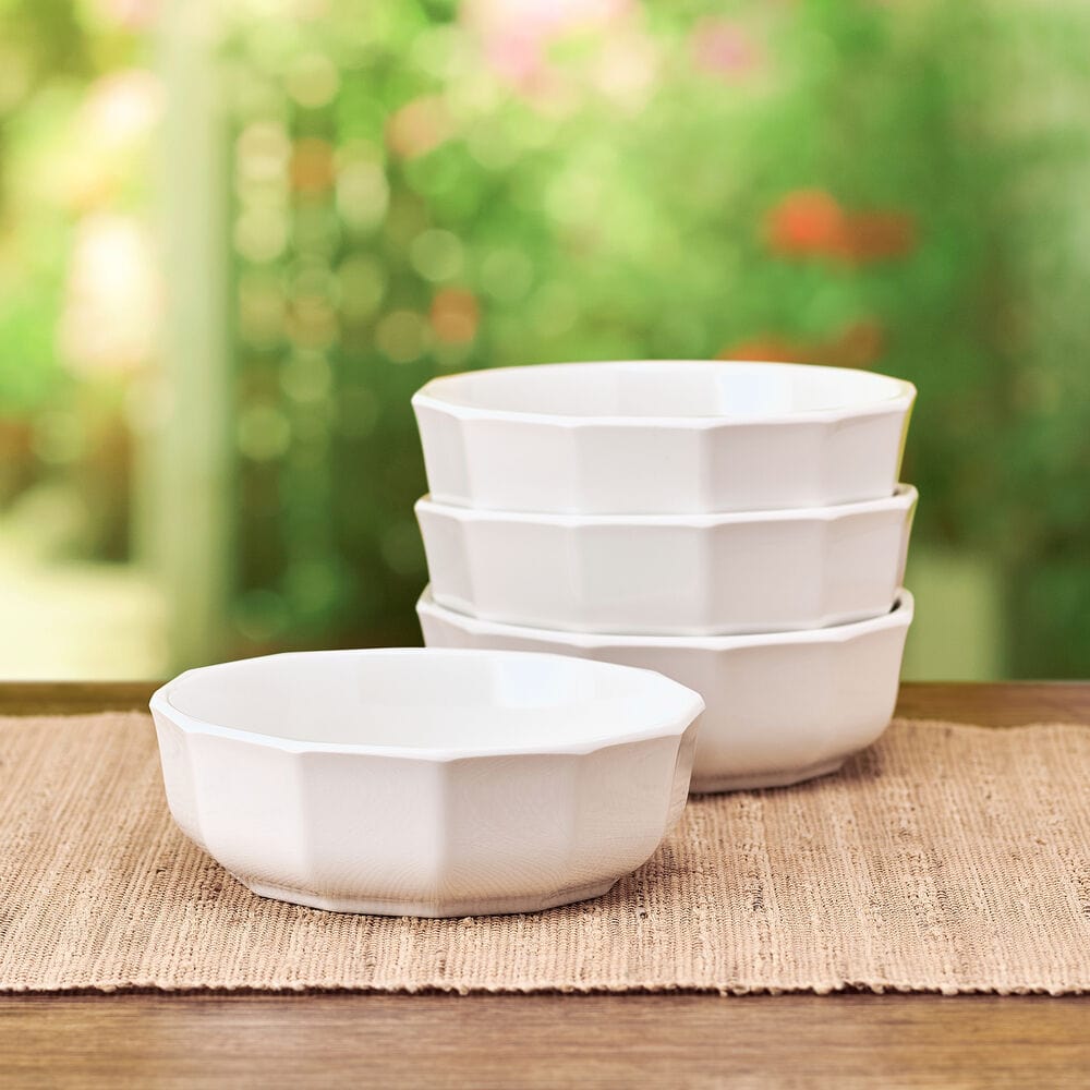 Heritage outdoor melamine bowl set showcasing 12-sided design in a dining setting.