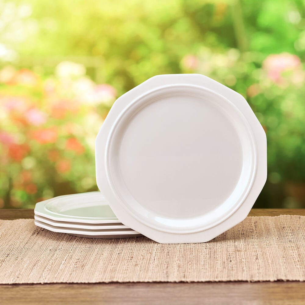 Heritage Collection outdoor salad plates showcasing geometric design and vibrant colors.
