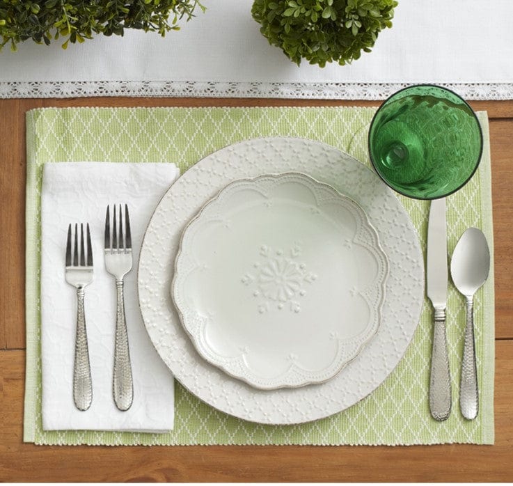 Dishwasher safe white dinner plates set in a modern kitchen