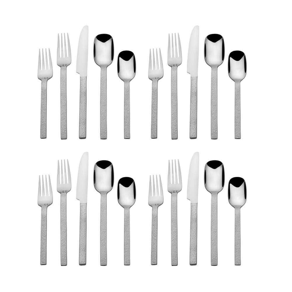 Elegant modern flatware set displayed on a dining table, perfect for formal dining.
