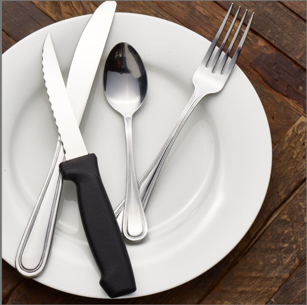 Rockport 16-piece flatware set displayed on a dining table, highlighting its elegant design.