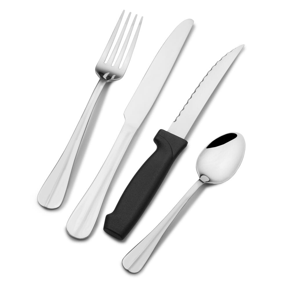 Flatware set arranged neatly on a dinner table, ready for family dinner