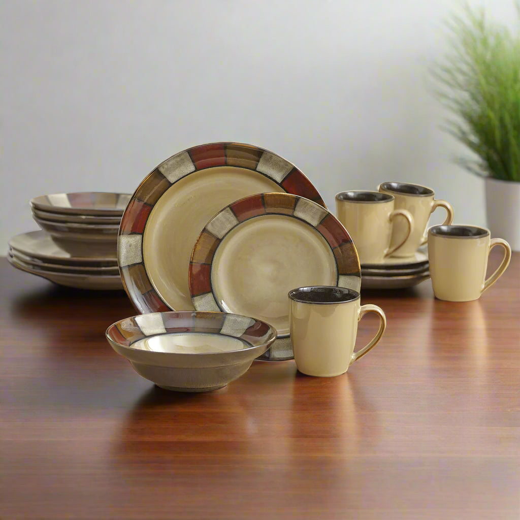 Overhead view of Taos stoneware dishes arranged for a family-style meal