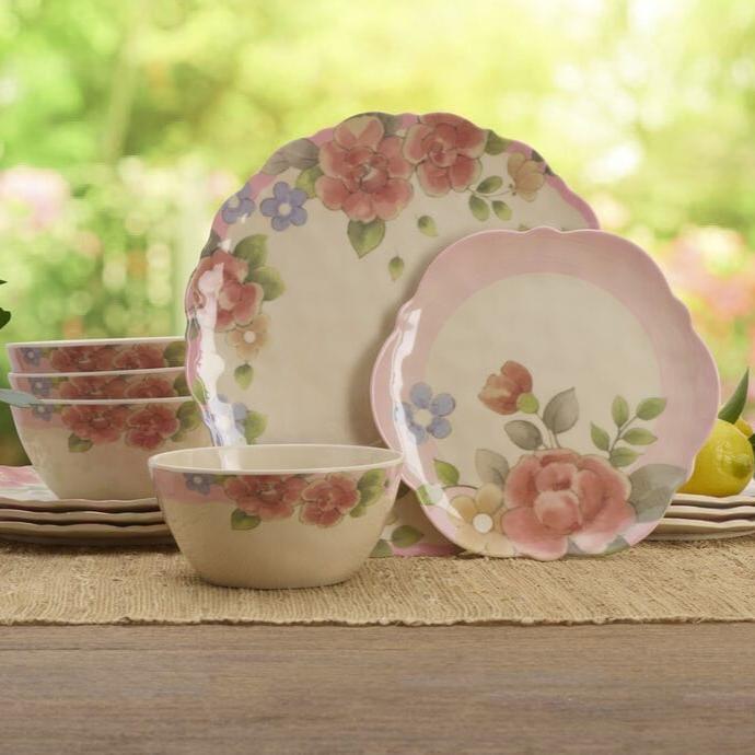 Close-up of watercolor rose pattern on melamine dinner plate for outdoor dining