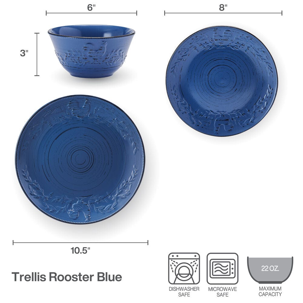 Close-up of blue stoneware dinner plate with rustic rooster design