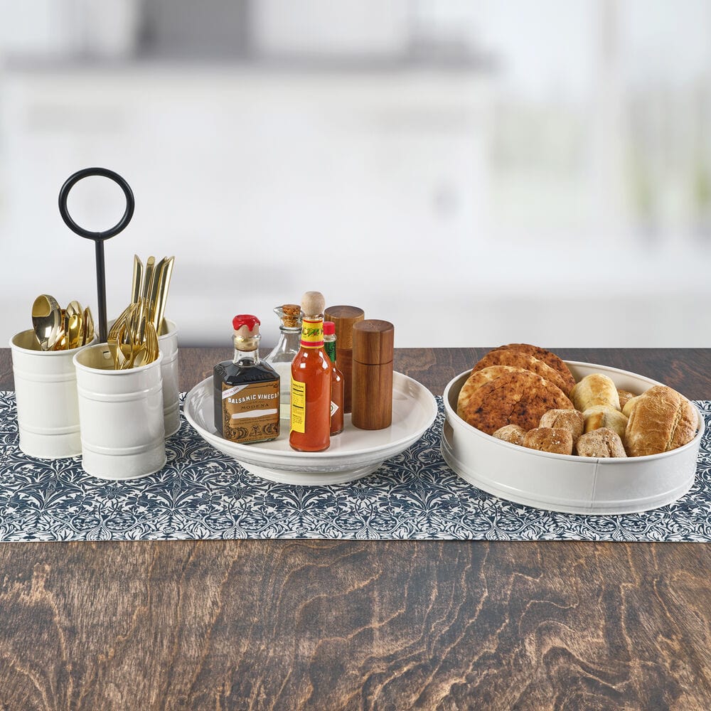 Sturdy iron utensil caddy on a kitchen countertop, perfect for everyday use and special occasions