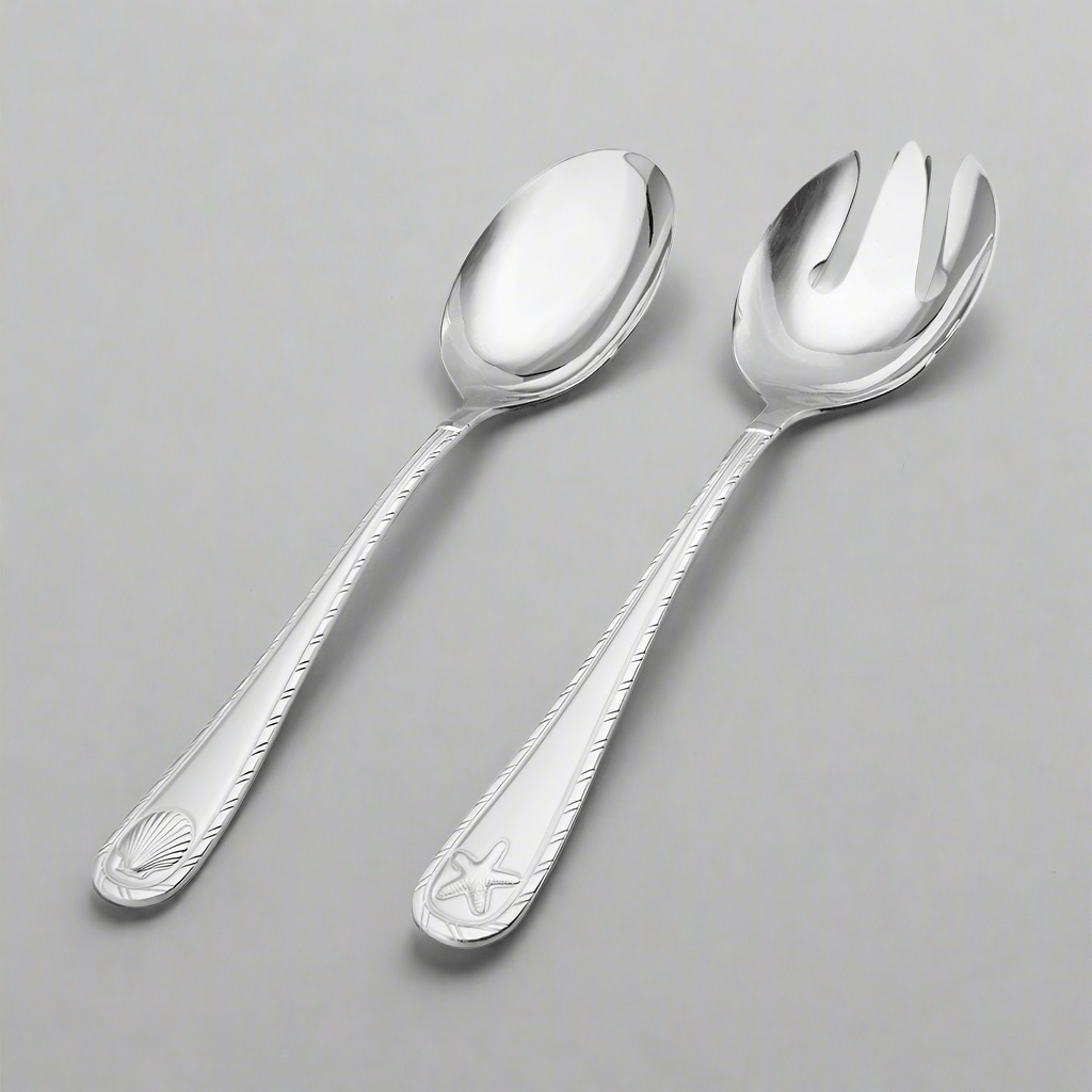 Antigua Frost stainless steel serving set with embossed shell motifs, front view