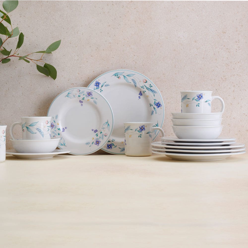 Close-up of a stylish stoneware dinner plate on a dinner table