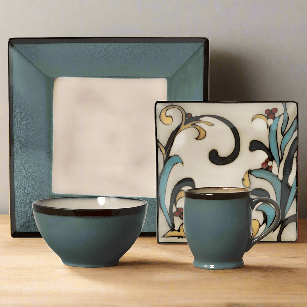 Square blue stoneware dinner plate with reactive glaze finish on a modern table