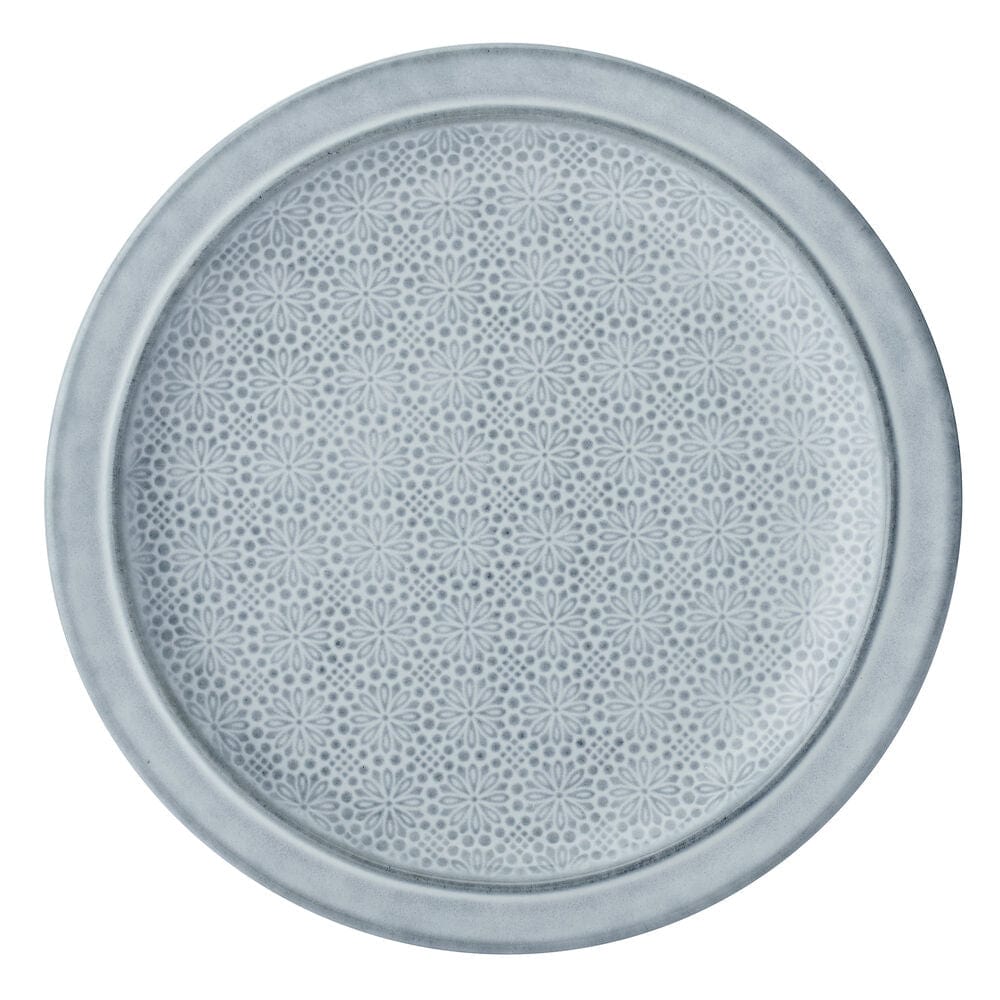 Set of stylish casual dining blue dinnerware on a modern table