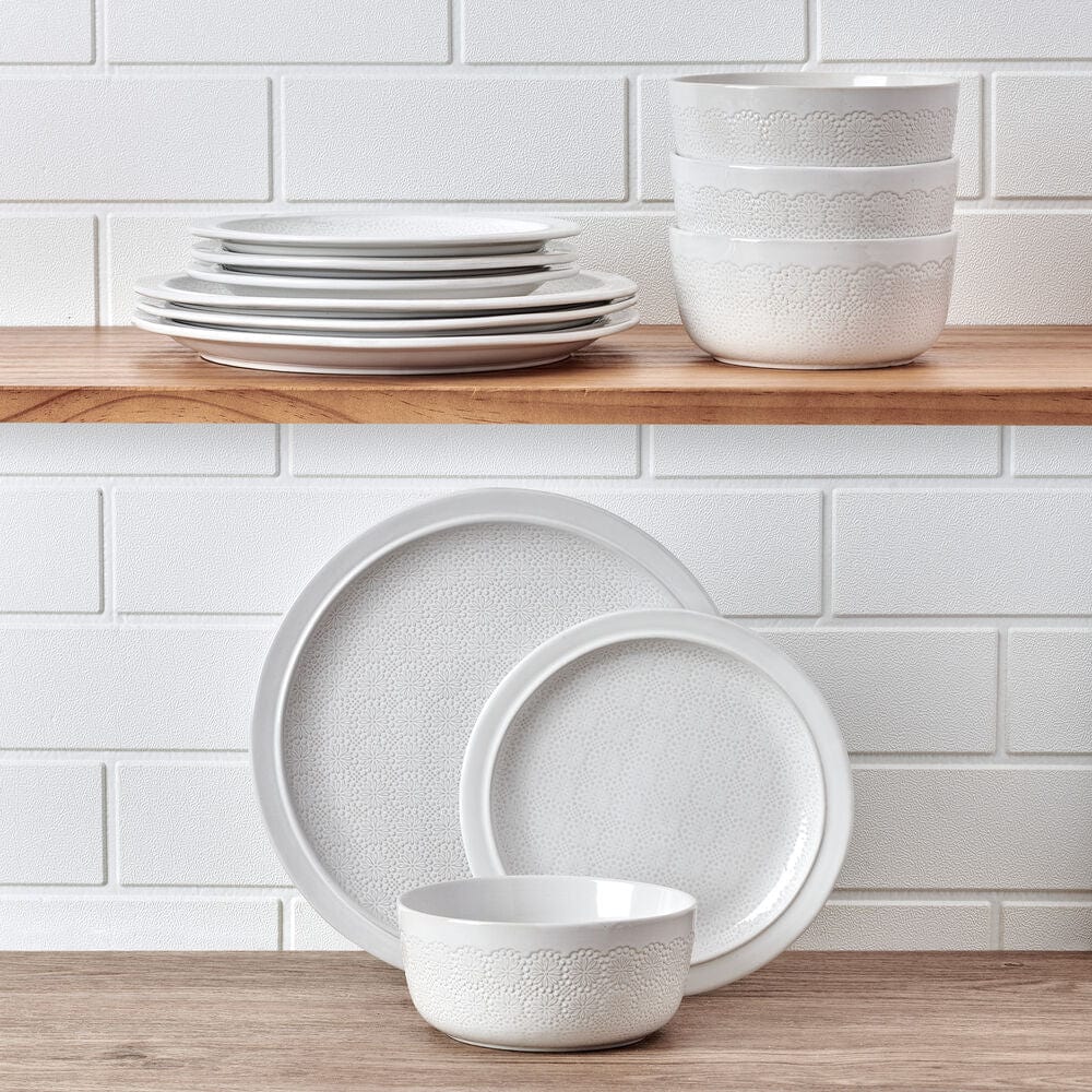 Close-up of Blooming Meadow 12-piece dinnerware set on a modern dining table