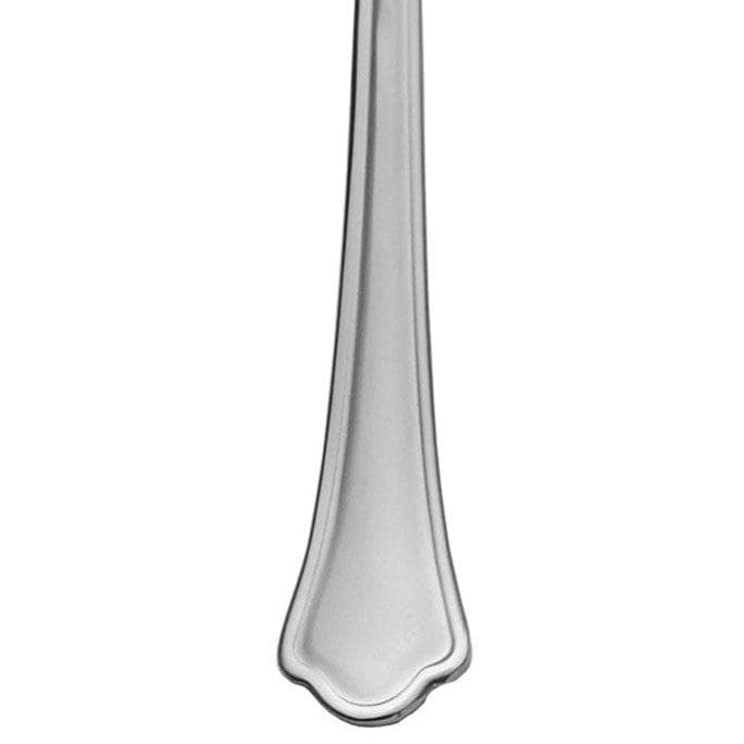 Close-up of Capri Frost flatware set showing scalloped tips and polished finish