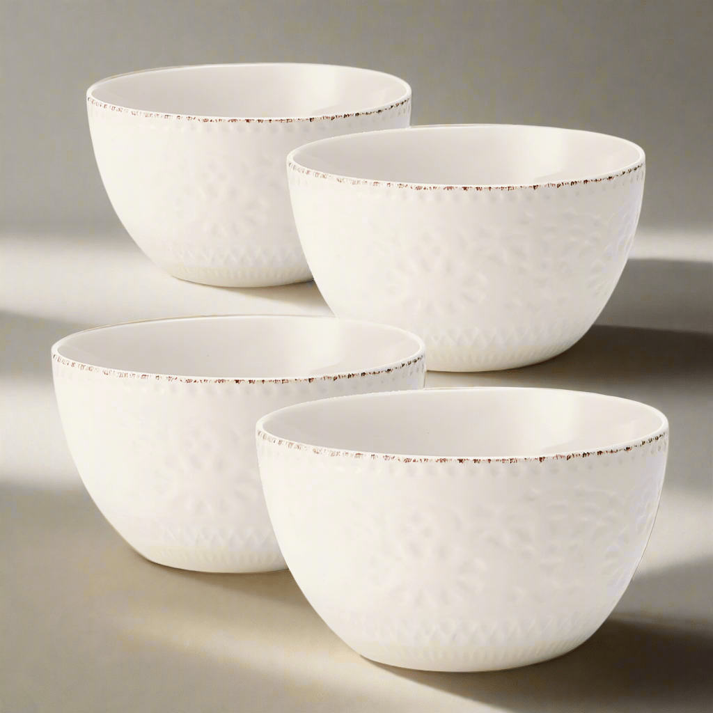 Close-up of Chateau Cream stoneware bowls showing their elegant design and size