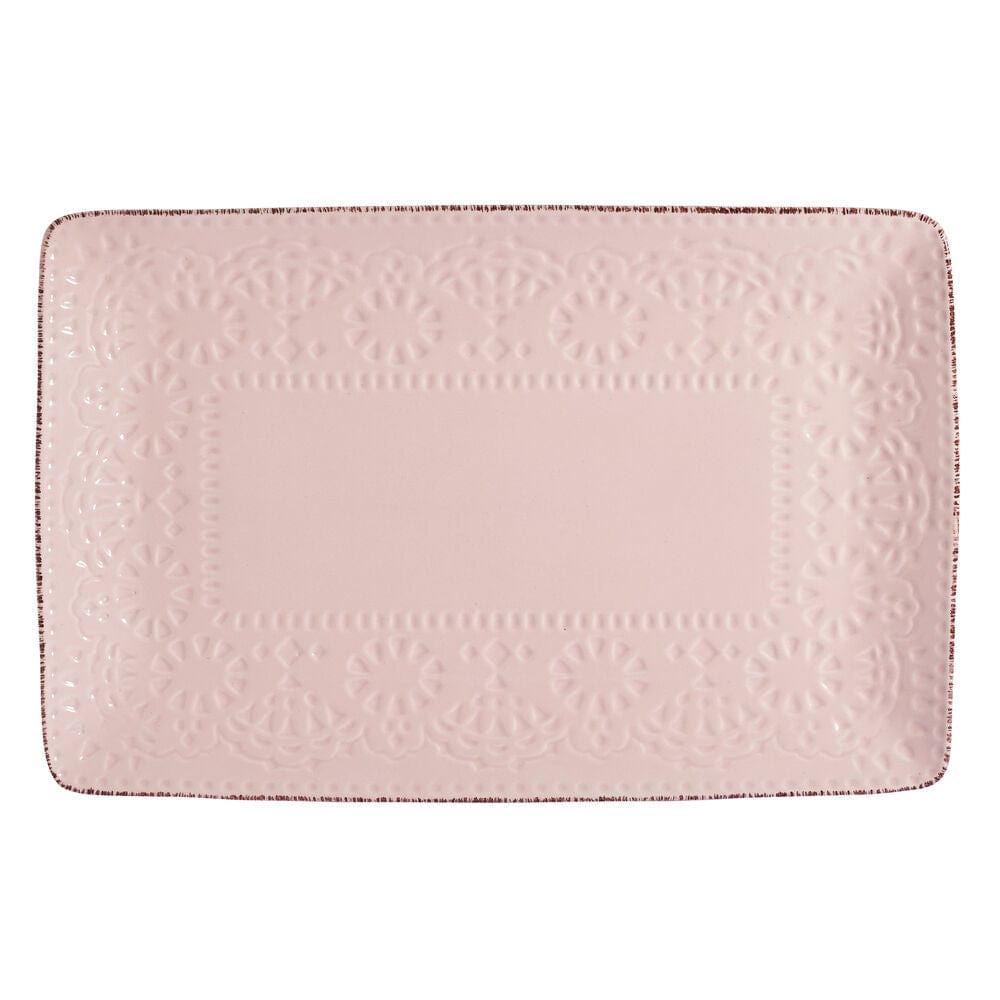 Close-up of the intricate lace-inspired dimpled texture on the pink serving tray