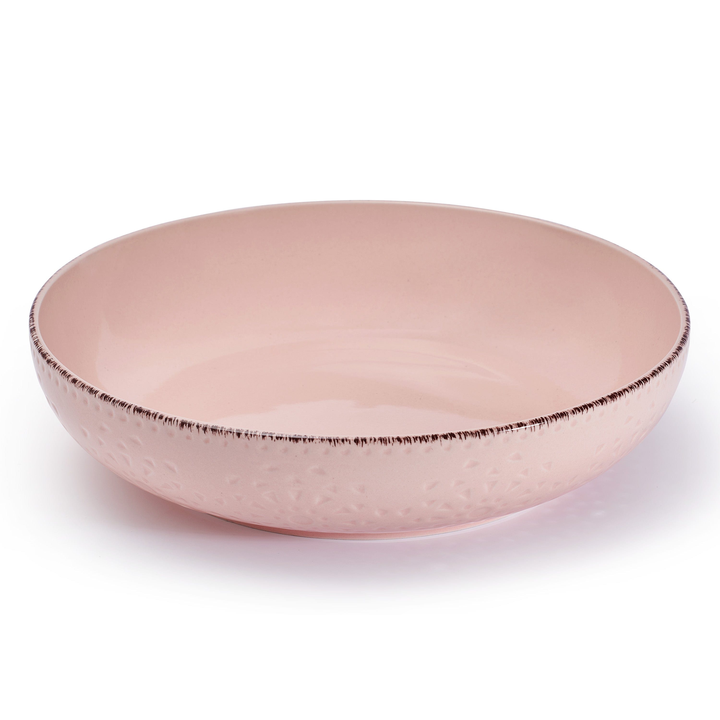 Large capacity pink pasta bowls arranged on a modern dining table setting