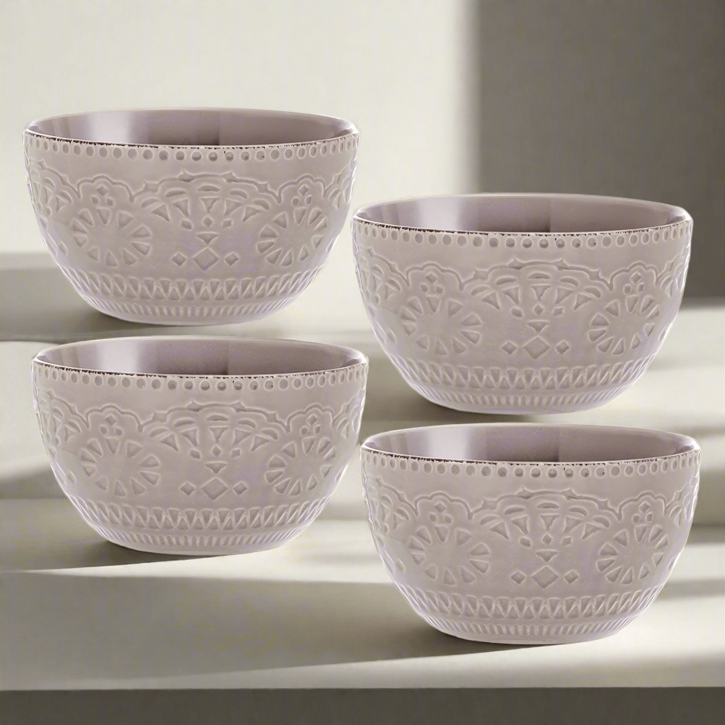Chateau Smoke stoneware bowl set showcasing intricate lace design from the side, ideal for soups.