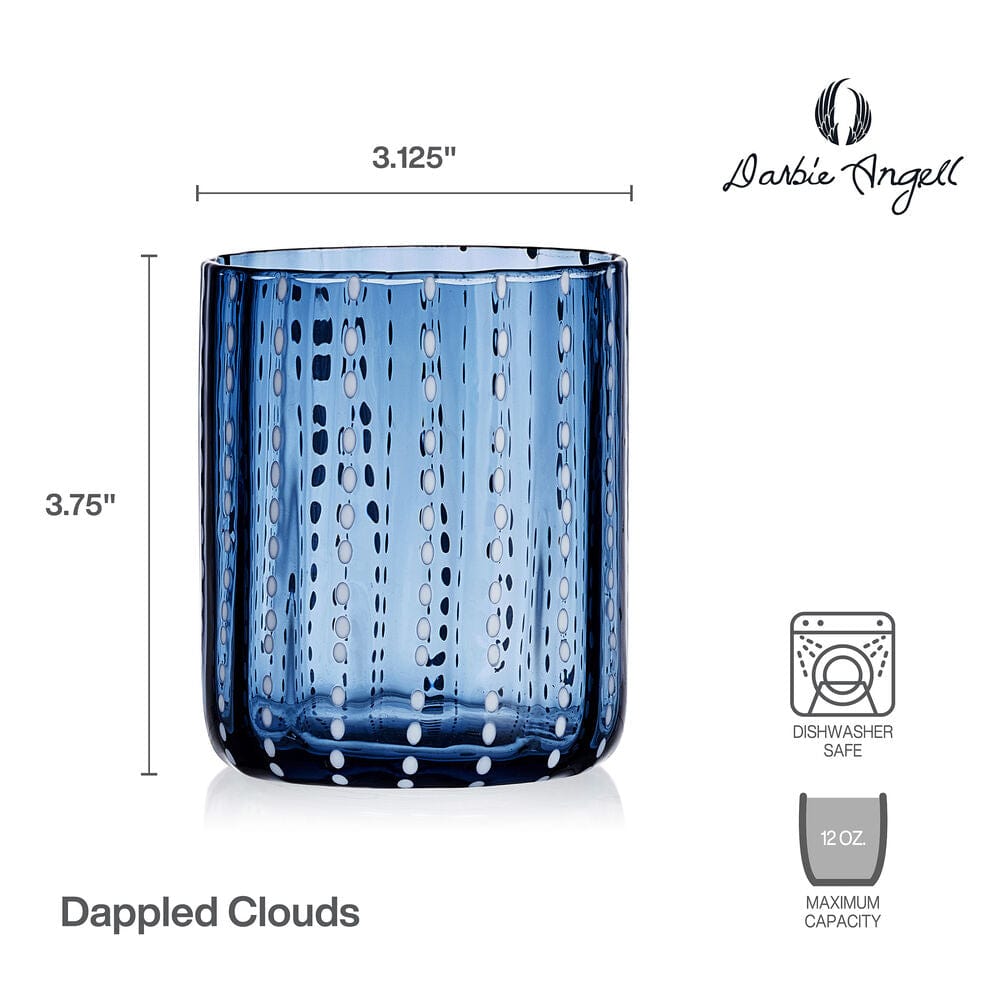 Cobalt double old fashioned glass set at a dinner table, showcasing its vibrant color and elegant design.