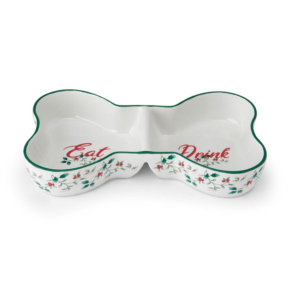 Close-up of the durable pet bowl with compartments, highlighting the holly berry design.