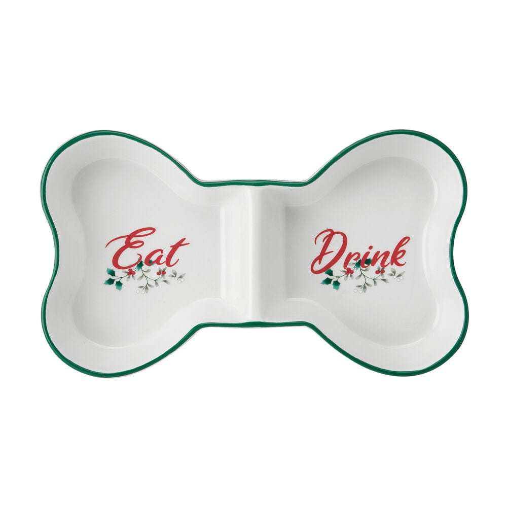 Close-up of the durable pet bowl with compartments, highlighting the holly berry design.