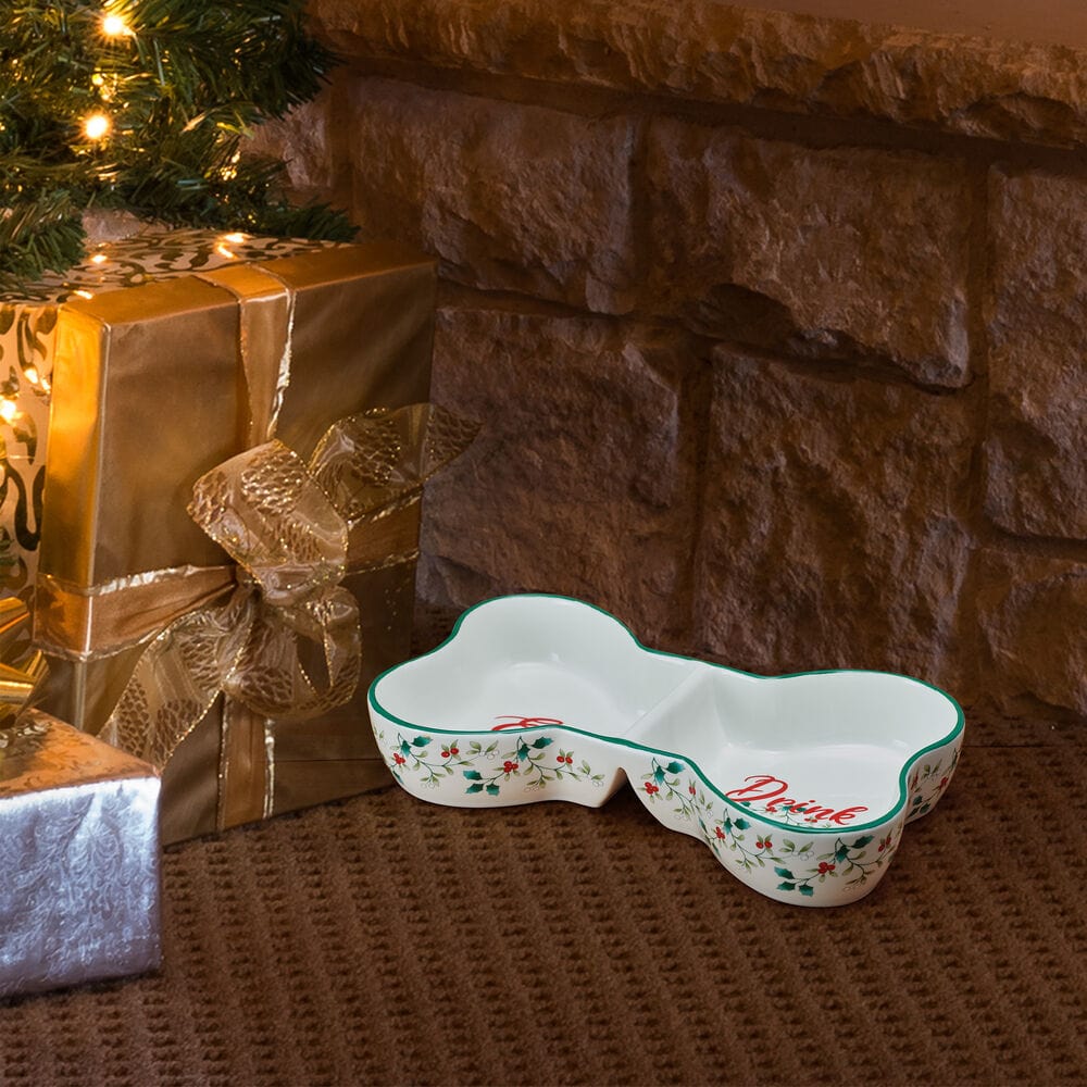 Festive winterberry divided dog bowl showcasing its compartments for food and water.