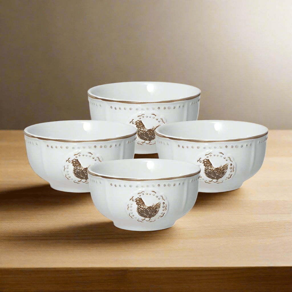 Overhead view of farmhouse stoneware fruit bowls set of 4 arranged on a rustic wooden table